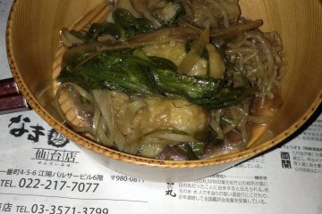 Nabe stew with Akita kiritanpo (fire-cooked rice dumplings) is highly recommended.
